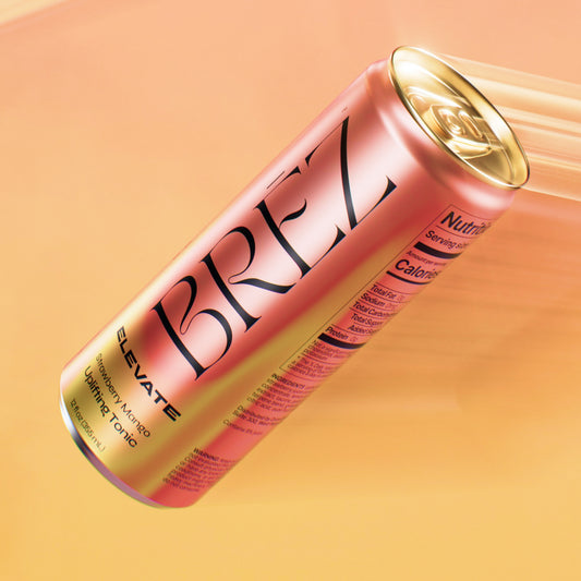 Pink can with gold lid labeled 'BREZ' on a peach background