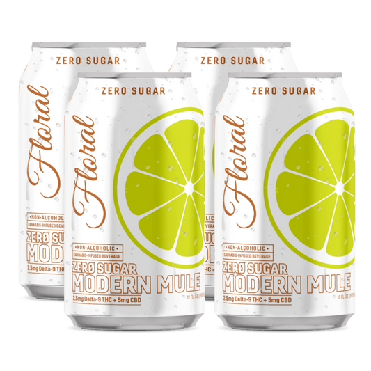 Five cans of 'Floral' zero sugar modern mule with lime slices on a white background