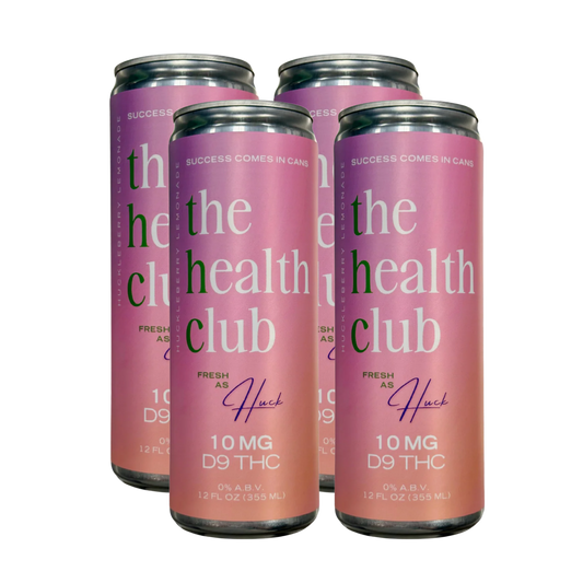 Four cans of 'the health club' with pink and purple design on a white background